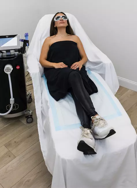 woman preparing for a moxi treatment at the luxe