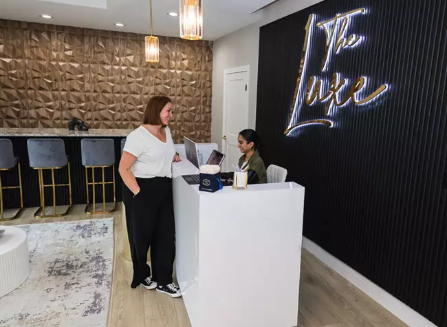 woman scheduling a consultation for laser hair removal at the luxe in columbus ohio